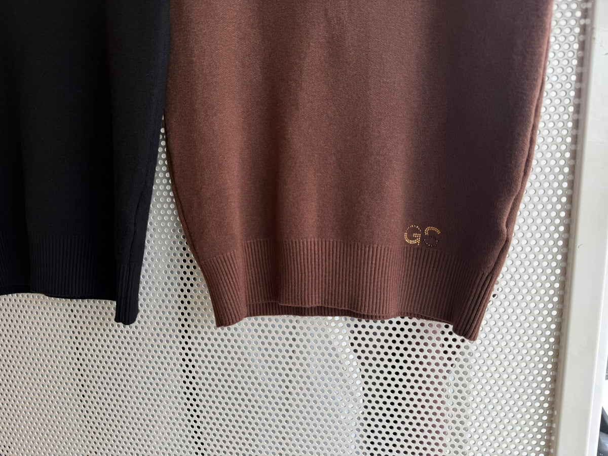 Elegantes Stricktop mit Strassdetails