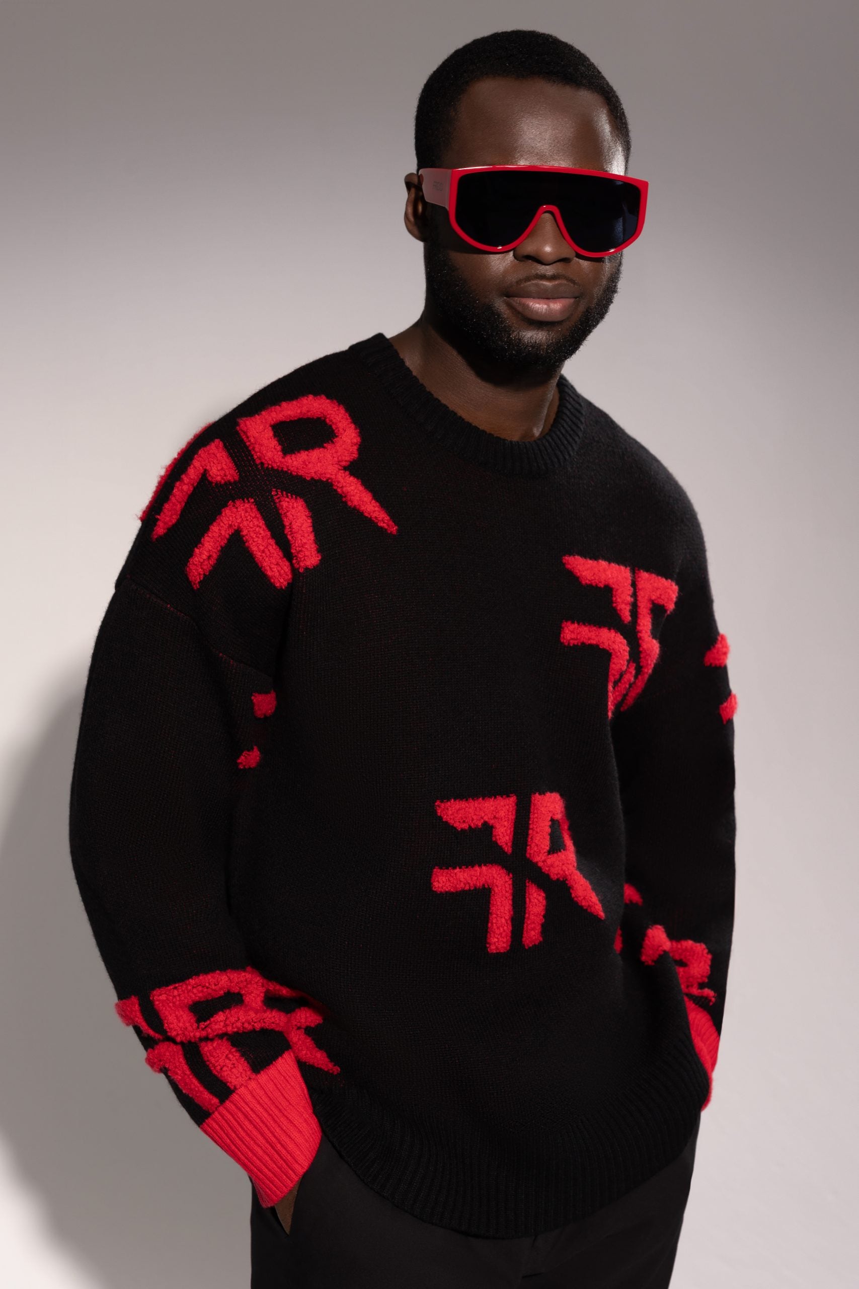 Merino Wool Jacquard Pullover with Extravagant puff logos in exquisite fire red