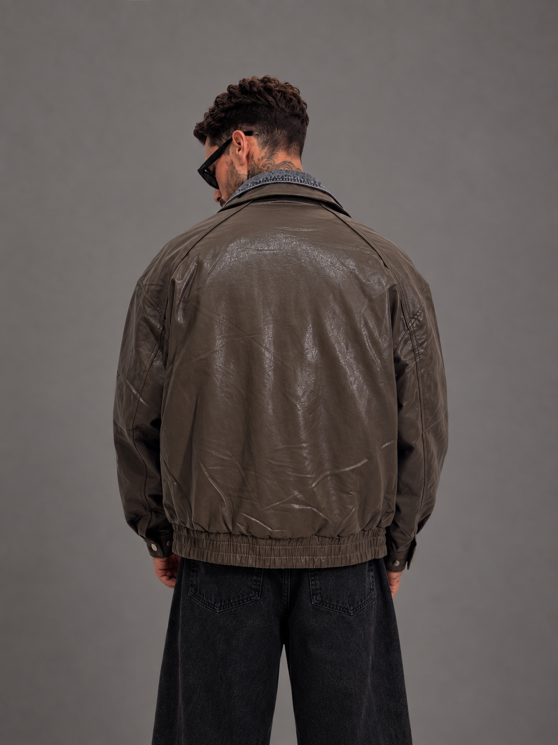 Oversize Jacke in Lederoptik mit Denim-Layering